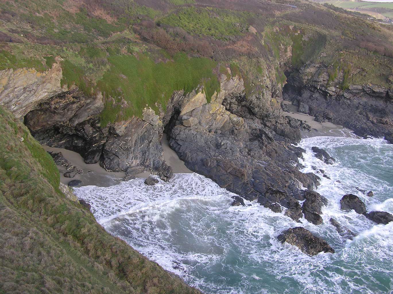 Prussia Cove - Piskie's Cove and caves at half tide